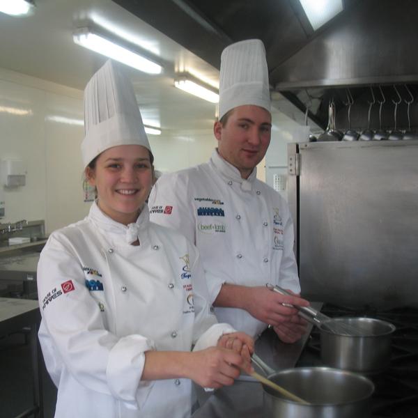 Cookery students Georgia Ball and Richard Bloxham prepare for the Nestle Toque d'Or competition